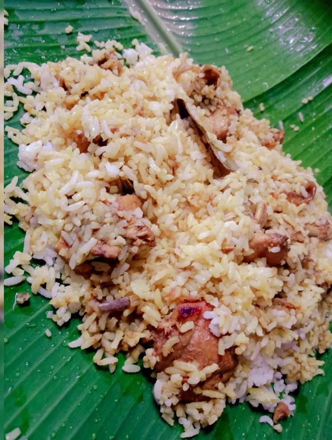 Chicken biryani served with raita